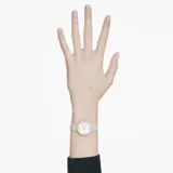 Reloj Certa con caja redonda de 30 mm en tono oro rosa y bisel con 30 cristales. Esfera guilloché con el logotipo del cisne de Swarovski e índices de cristal. Correa de piel italiana color beige.