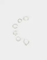 Set de seis earcuffs dorados con diferentes diseños.