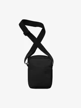 Bandolera Carhartt Jake de lona de poliéster reciclado repelente al agua, color negro, con compartimento principal con cremallera, bolsillo frontal y bolsillo interior de malla.