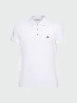 Remera polo blanca de algodón de manga corta con cuello clásico y logo bordado en el pecho.