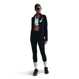 Campera deportiva Nike negra con cierre frontal, logo Swoosh blanco en el pecho y corte entallado.