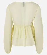 Blusa femenina de chiffon color amarillo pálido, con escote en V profundo, lazada ajustable en el centro del busto y mangas largas ajustadas. Presenta un diseño con volados en el ruedo.