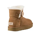 Botas de piel de oveja color tostado, con botón de madera y parte superior ajustable.