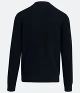 Suéter azul marino de corte slim, cuello redondo y manga larga, confeccionado en algodón texturizado.