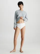 Colaless blanco de cintura alta Calvin Klein, confeccionado en microfibra elástica con logo en la cintura.
