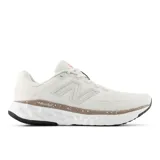 Championes New Balance Evoz V4 para dama, color blanco con detalles en marrón y negro.