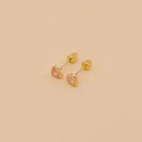 Par de abridores con forma de corazón en oro amarillo 9k con circonia rosa.