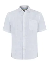 Camisa de manga corta blanca con textura multicolor, confeccionada en lino orgánico y tencel. Tiene bolsillo en el pecho con botón.