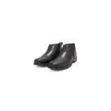 Botas de cuero negro con diseño minimalista y sin cordones, ofreciendo facilidad y comodidad al calzarlas.