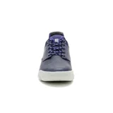 Zapatillas Caterpillar Hex Lite Leather color azul marino con detalles en violeta y suela blanca. Capellada de cuero flor, forro interno de materiales reciclados, plantilla de espuma PU, suela de EVA liviana.