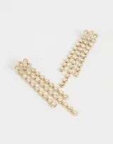 Aros largos dorados con tiras de strass colgantes.