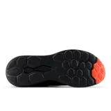 Championes New Balance modelo 411 V3, color negro, con suela Ground Contact EVA y almohadillas de goma.
