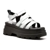 Sandalias con plataforma Korium Ashley, color dorado, con tiras horizontales y hebilla lateral.