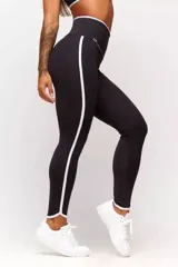 Calza deportiva azul marino con cintura alta y detalles en blanco en cintura y laterales.
