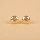 Par de caravanas de oro amarillo 18k con circonias engarzadas.