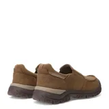 Zapatos casuales tipo mocasín Caterpillar Threshold, color marrón claro (beige natural), confeccionados en lona (canvas) con puntera y suela de goma marrón oscuro. Diseño sin cordones con elástico lateral para ajuste.