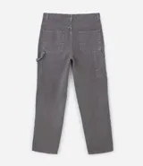 Pantalón baggy de sarga color gris con efecto marmolado, tiro alto, bolsillos laterales y traseros, y trabillas en la cintura.