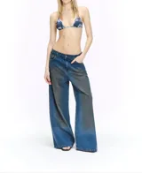 Pantalón de jean ancho con efecto de desteñido en color óxido.