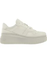 Zapatillas deportivas Tommy Jeans color crema, con plataforma gruesa y logo de la marca en el lateral.
