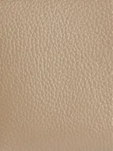 Billetera triple Calvin Klein color beige con logo metálico plateado.