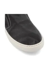 Zapatillas slip-on azules de algodón orgánico con suela de caucho natural.