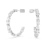 Aros tipo argolla Swarovski Mesmera bañados en rodio con circonias blancas de diferentes tallas engarzadas en garra. Cierre con perno.