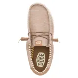 Zapatos Hey Dude Wally Stretch Mesh color beige, con cordones elásticos y suela blanca con motas de colores.