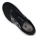 Championes de running New Balance modelo M520, color negro con detalles plateados y suela blanca.