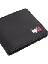 Billetera plegable de cuero negro con logo Tommy Jeans en la parte inferior. Interior con múltiples ranuras para tarjetas y billetes.