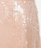 Minifalda de lentejuelas espejadas color rosa pálido, de tiro alto y corte ajustado.