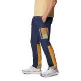 Pantalón largo de hombre Columbia, modelo Challenger Windbreak, color azul marino con detalles en naranja y bolsillo con cierre en el muslo.