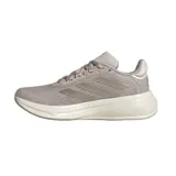 Championes de running Adidas Response Super, color beige con detalles plateados y suela blanca.