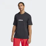 Remera Adidas Essentials Linear Single negra de corte clásico con cuello redondo y logo blanco estampado en el pecho.