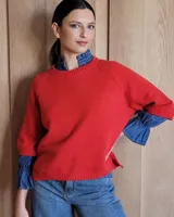 Sweater rojo de lana lambswool con mangas 3/4.