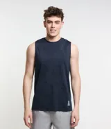Musculosa deportiva amarilla de poliéster con tecnología dry, cuello redondo y estampado jacquard.