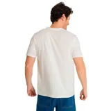 Remera de manga corta color crema con estampado de maquinaria de construcción y el logo de Caterpillar.
