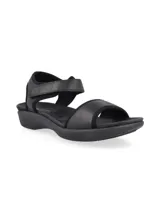 Sandalias blancas con detalles en gris, con ajuste de velcro en el tobillo y suela anatómica.