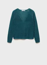 Jersey de punto fino color verde esmeralda con cuello pico y manga larga. Tejido con lurex.