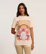 Remera color crema de algodón con estampa floral, cuello redondo y manga corta.