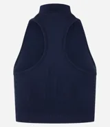 Top deportivo negro con cuello alto, escote halterneck y media cremallera. Confeccionado en poliamida seamless sin copa.