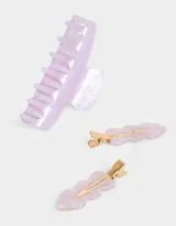 Set de accesorios para el pelo color rosa claro, que incluye un broche curvo y dos hebillas con forma ondulada, todos de acrílico.