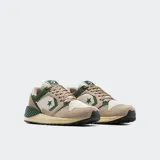 Championes Converse Wave Trainer Peak Style color beige y verde, con capellada de malla y gamuza, amortiguación de espuma CX y mediasuela viscoelástica.
