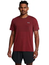 Remera deportiva gris jaspeado de corte clásico, con cuello redondo y mangas cortas. Confeccionada con tejido de punto transpirable y tecnología seamless para mayor comodidad.