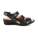 Sandalia de cuero sintético color celeste con plataforma marrón y ajuste con velcro.