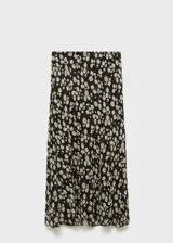 Falda midi negra de gasa con estampado de pequeñas flores blancas.