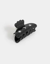 Broche para el pelo negro con strass y detalles de luna y estrellas.