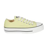 Zapatillas Converse Chuck Taylor All Star Lift color amarillo pastel, con plataforma blanca y detalles en negro.