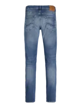 Jean de calce slim fit con tiro bajo, rodilla ceñida y abertura de pierna ajustada. Diseño clásico de cinco bolsillos y cierre con botón.