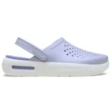 Zuecos Crocs InMotion color lavanda con suela blanca y detalles en lila. Diseño con orificios de ventilación y correa trasera pivotante.