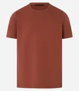 Remera de algodón color ladrillo, corte slim fit, cuello redondo y mangas cortas.